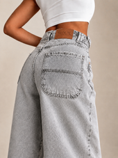 SIGNATURE BELTED BALLOON JEANS